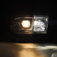 Thumbnail for AlphaRex 22-23 Toyota Tundra NOVA-Series Headlights Black w/Amber DRL - Req 810029 OR 810030