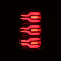 Thumbnail for AlphaRex 19-21 Dodge Ram 1500 Luxx-Series LED Tail Lights Black/Red w/Activ Light/Seq Signal