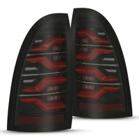 Thumbnail for AlphaRex 05-15 Toyota Tacoma LUXX LED Taillights Blk/Red w/Activ Light/Seq Signal