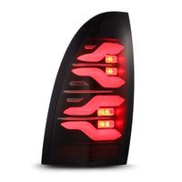 Thumbnail for AlphaRex 05-15 Toyota Tacoma LUXX LED Taillights Blk w/Activ Light/Seq Signal