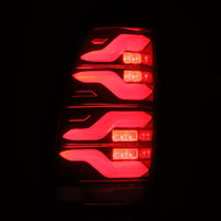 Thumbnail for AlphaRex 05-15 Toyota Tacoma LUXX LED Taillights Blk/Red w/Activ Light/Seq Signal