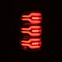 Thumbnail for AlphaRex 19-21 Dodge Ram 1500 Luxx-Series LED Tail Lights Alpha-Black w/Activ Light/Seq Signal