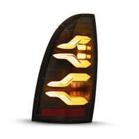 Thumbnail for AlphaRex 05-15 Toyota Tacoma LUXX LED Taillights Blk w/Activ Light/Seq Signal