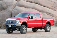 Thumbnail for Fabtech 05-07 Ford F250 4WD w/o Factory Overload 6in 4Link Sys w/Coils & Perf Shks