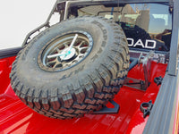 Thumbnail for DV8 Offroad 2019+ Jeep Gladiator In-Bed Adjustable Tire Carrier