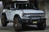 Thumbnail for DV8 Offroad 21-22 Ford Bronco Factory Front Bumper Licence Relocation Bracket - Front